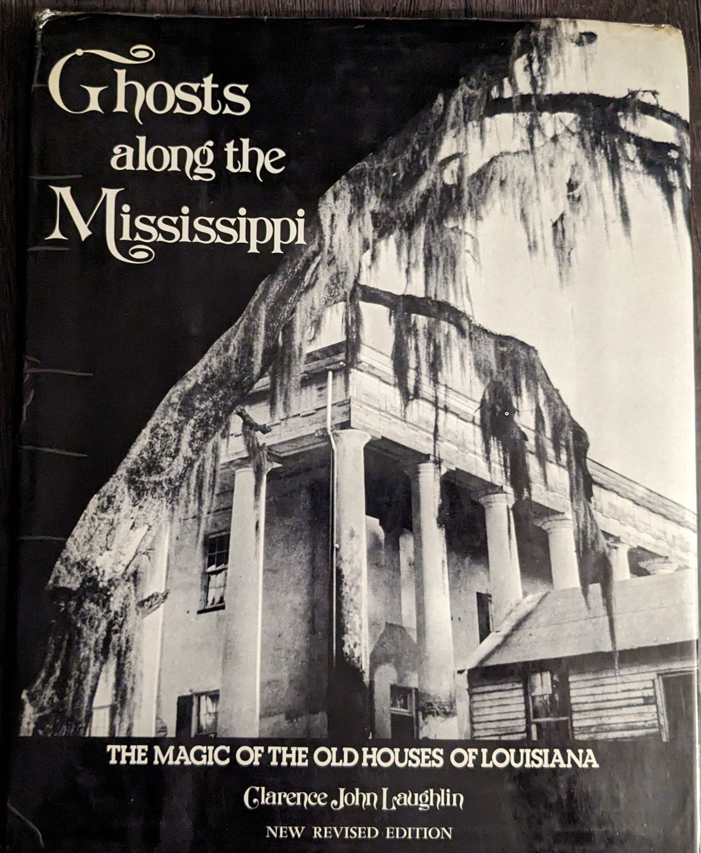 Ghosts Along the Mississippi: The Magic of the Old Houses of Louisiana by John Clarence Laughlin