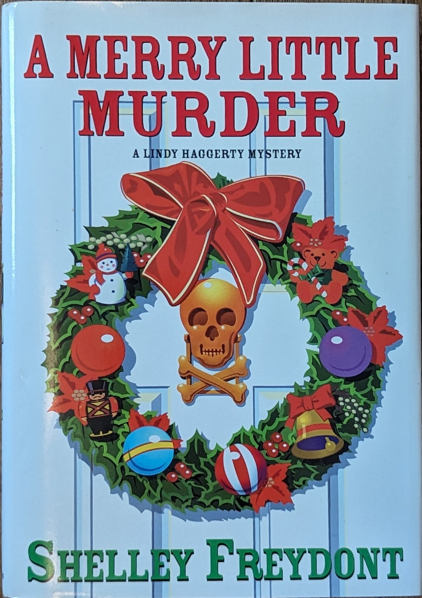 A Merry Little Murder by Shelley Freydont