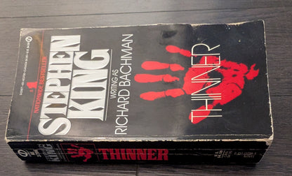 Thinner by Stephen King writing as Richard Bachman