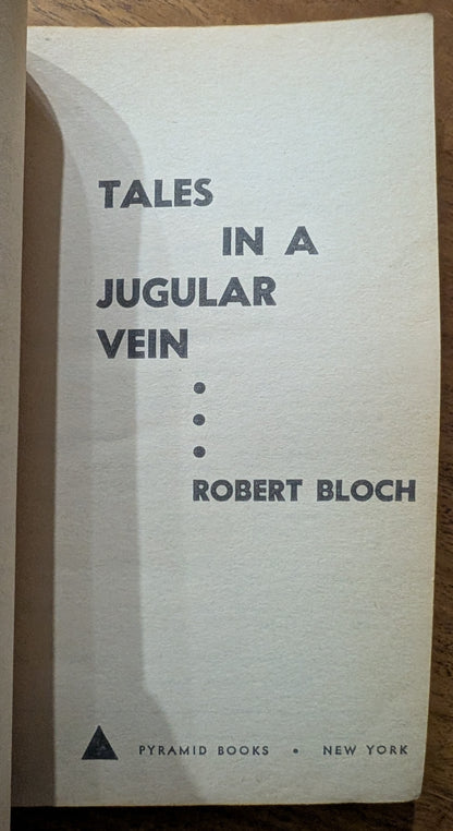 Tales in a Jugular Vein by Robert Bloch