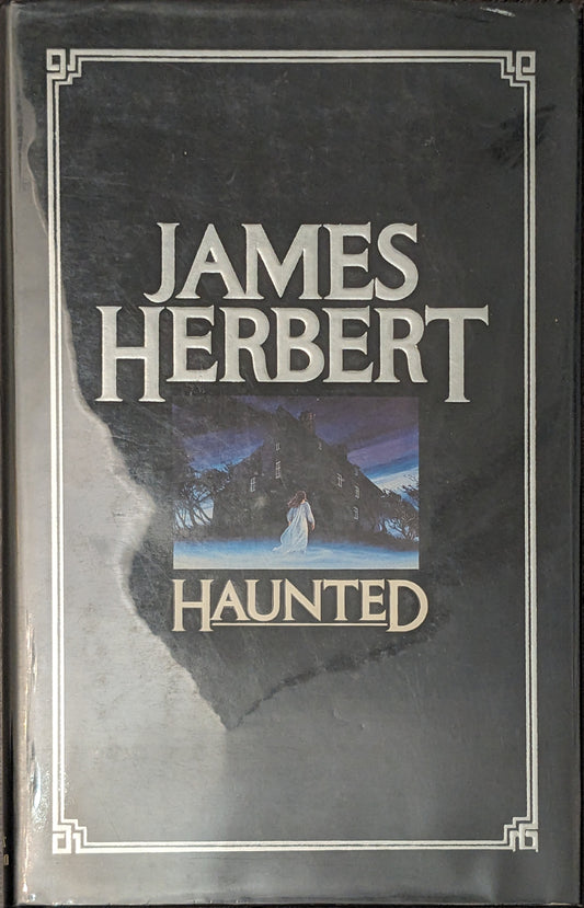 Haunted by James Herbert